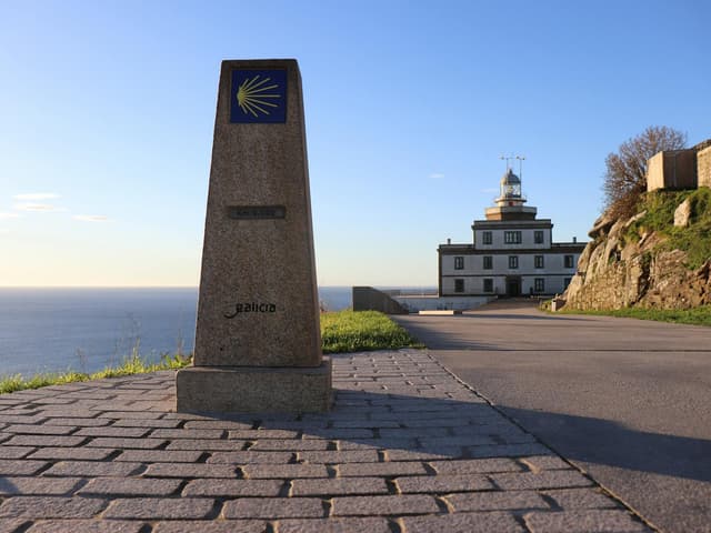 Sunset at the lighthouse at Cape Fisterra, the traditional "end of the world" on the Camino de Santiago
